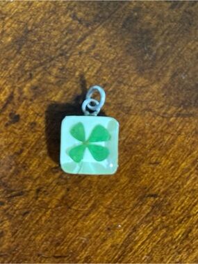 Green Four-Leaf Clover Glass Charm Pendant set in sterling silver